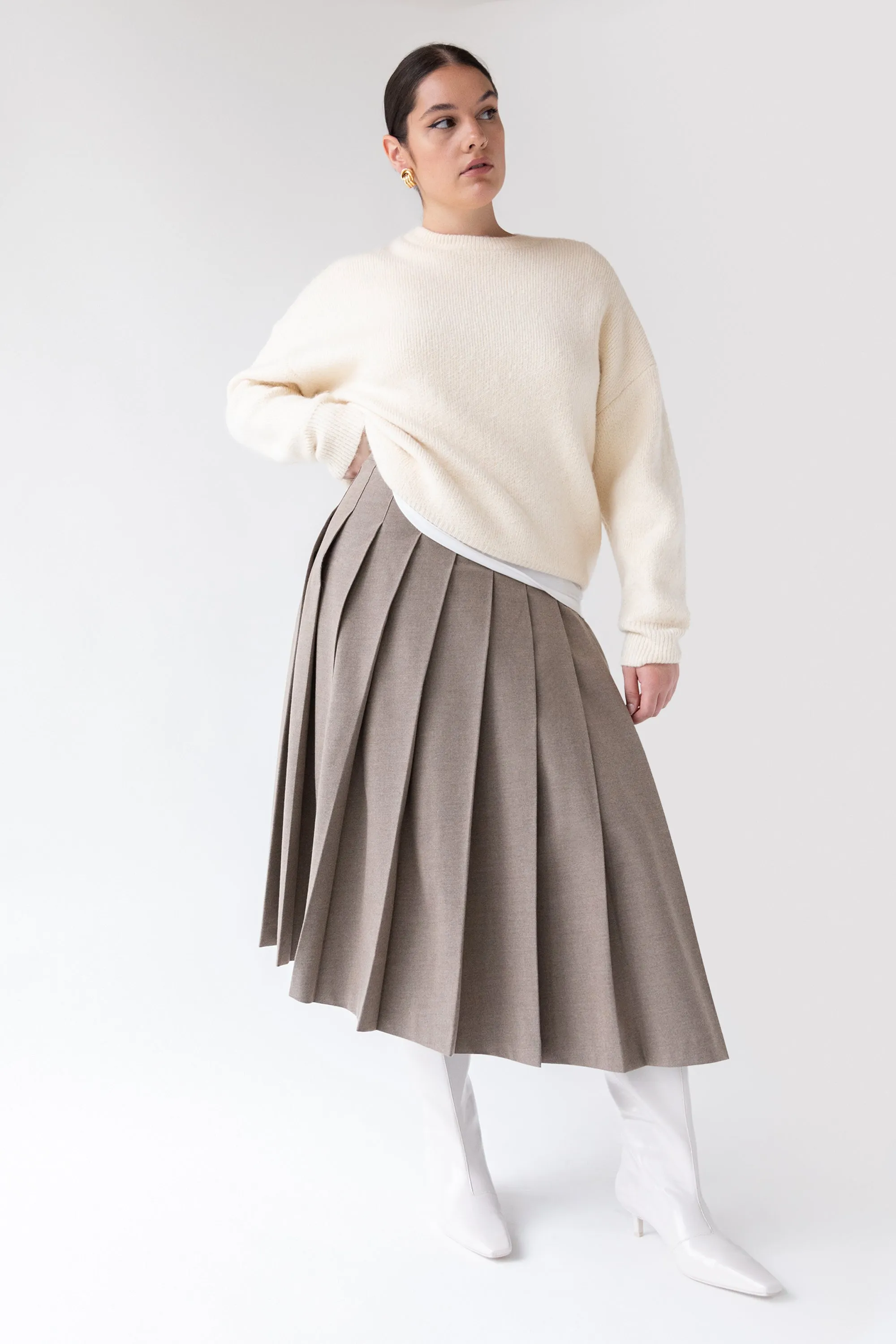 MIDI PLEATED ASYMMETRICAL SKIRT