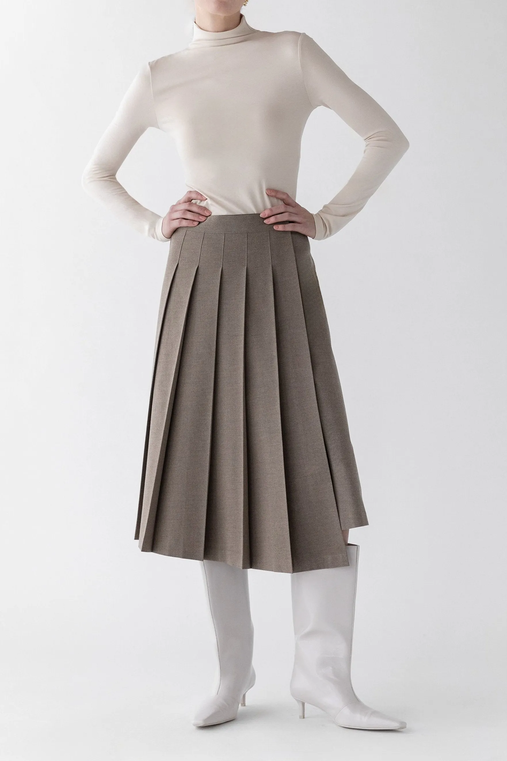 MIDI PLEATED ASYMMETRICAL SKIRT